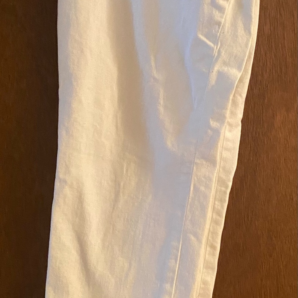 White ankle jeans with lace embellishment
